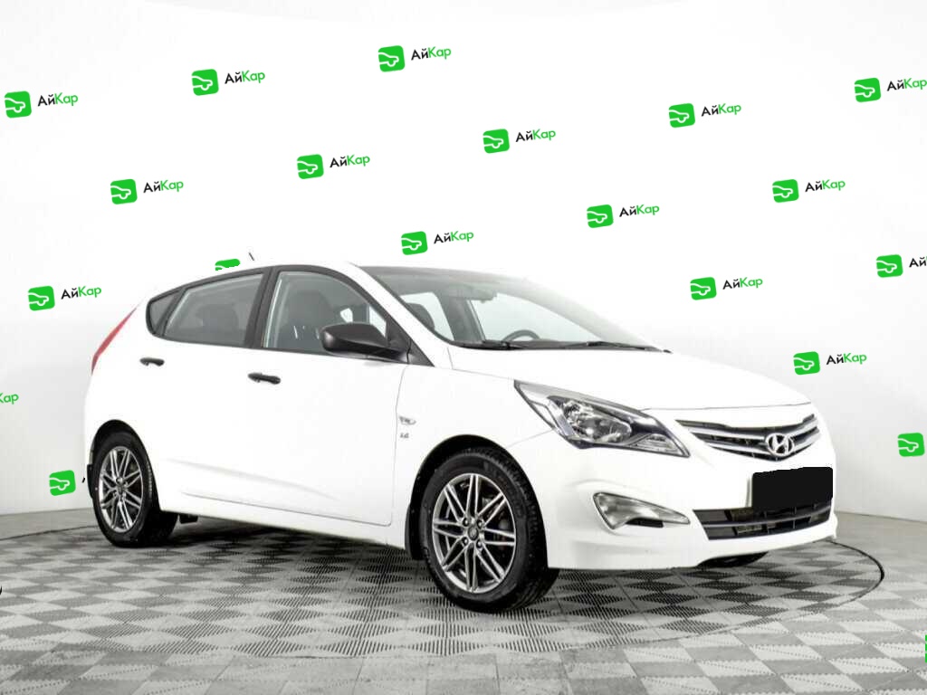 Hyundai Solaris с пробегом — 2014 год. Фото: #2