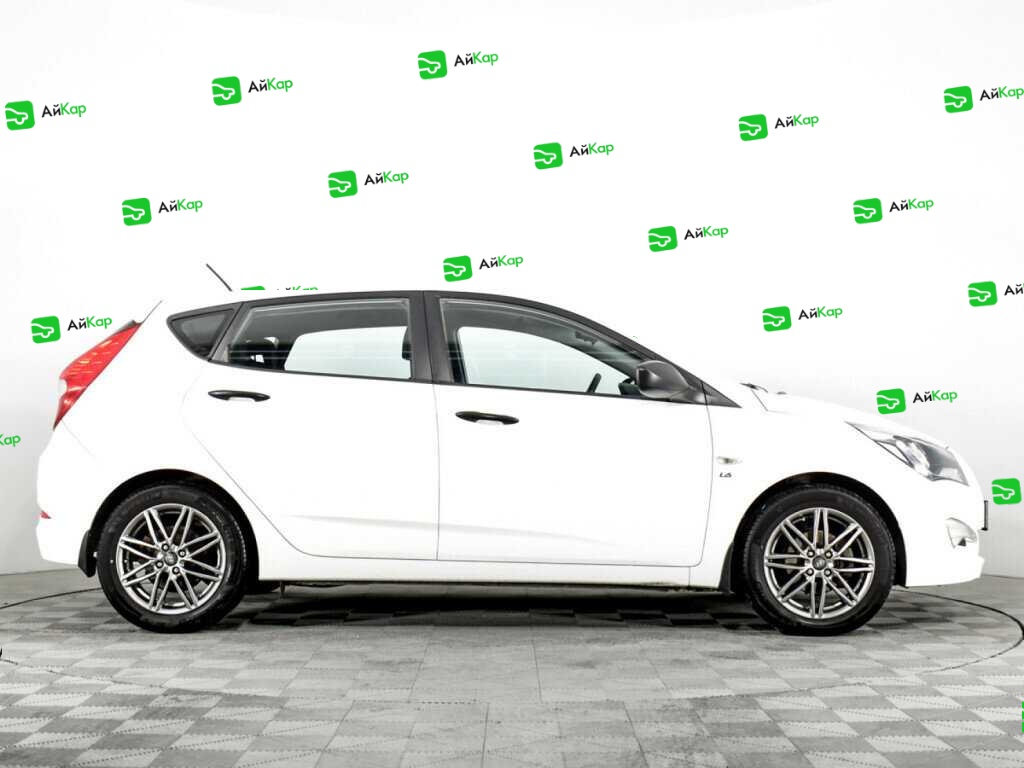 Hyundai Solaris с пробегом — 2014 год. Фото: #3