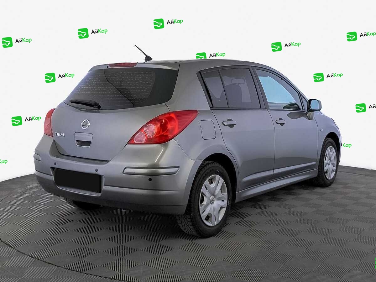 Nissan Tiida с пробегом — 2013 год. Фото: #4