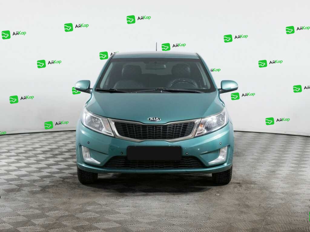 Kia Rio с пробегом — 2013 год. Фото: #1