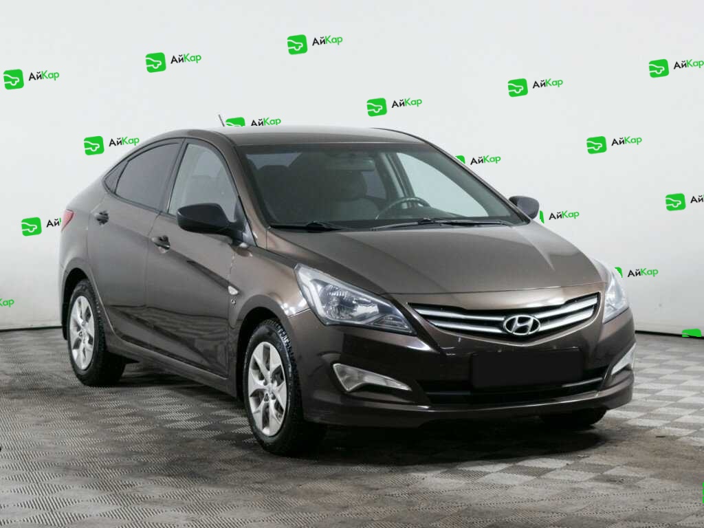 Hyundai Solaris с пробегом — 2014 год. Фото: #2