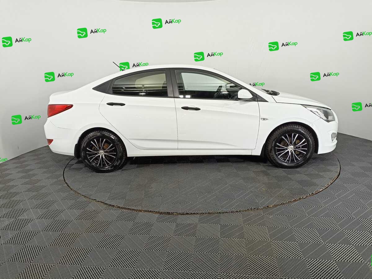 Hyundai Solaris с пробегом — 2015 год. Фото: #3