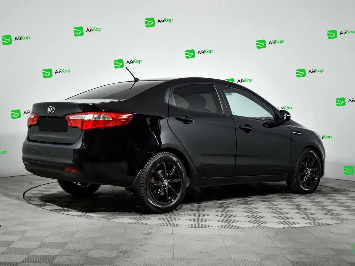 Kia Rio с пробегом — 2013 год. Фото: #4