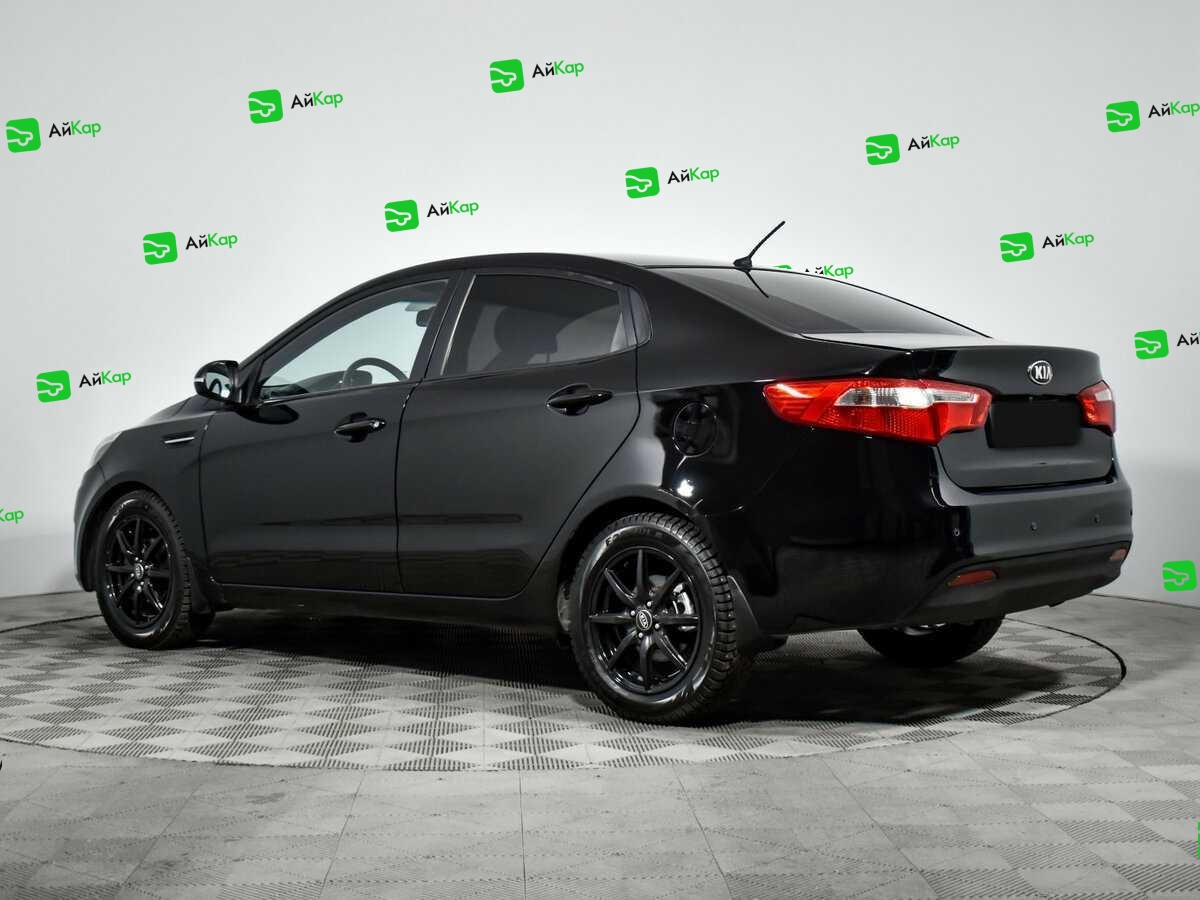 Kia Rio с пробегом — 2013 год. Фото: #6