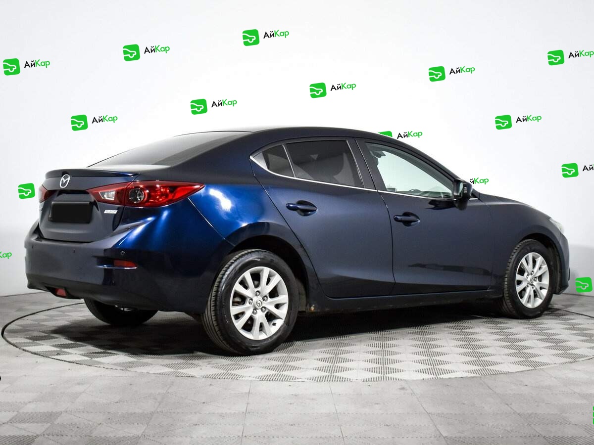 Mazda 3 с пробегом — 2014 год. Фото: #4