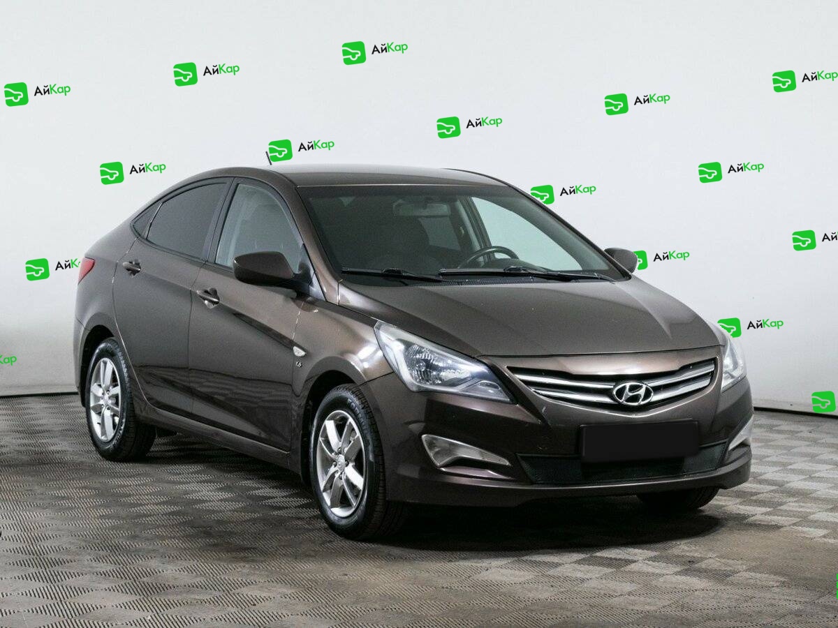 Hyundai Solaris с пробегом — 2014 год. Фото: #2