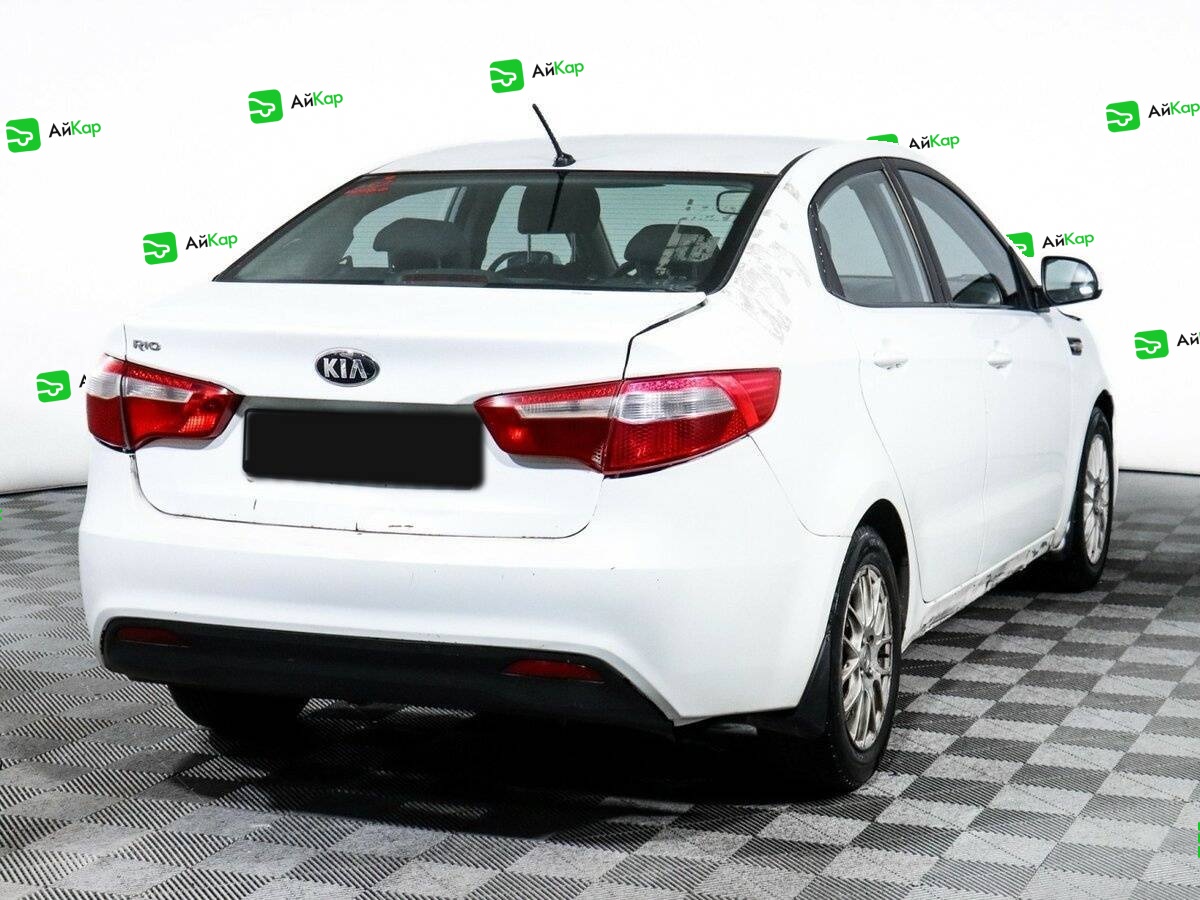 Kia Rio с пробегом — 2013 год. Фото: #3