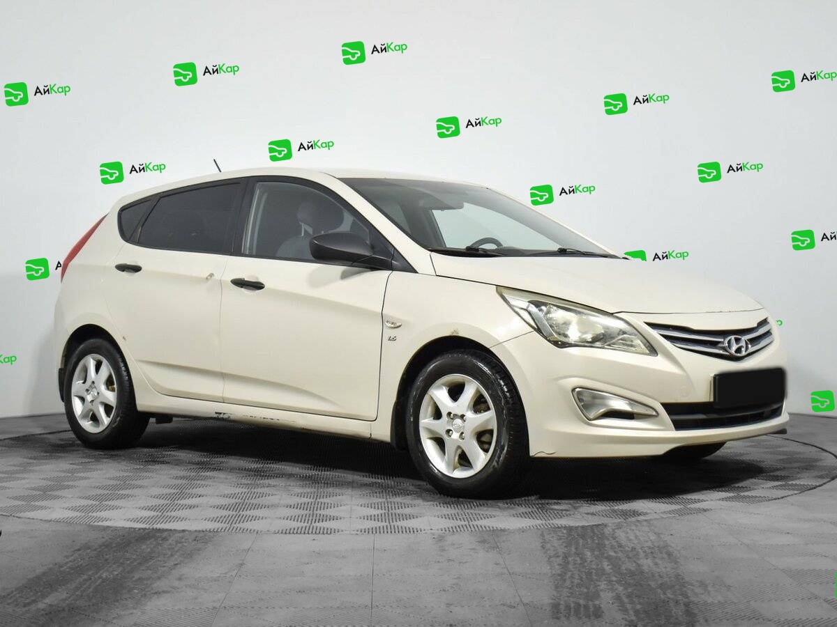 Hyundai Solaris с пробегом — 2015 год. Фото: #2