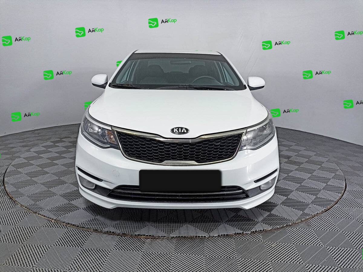 Kia Rio с пробегом — 2015 год. Фото: #1