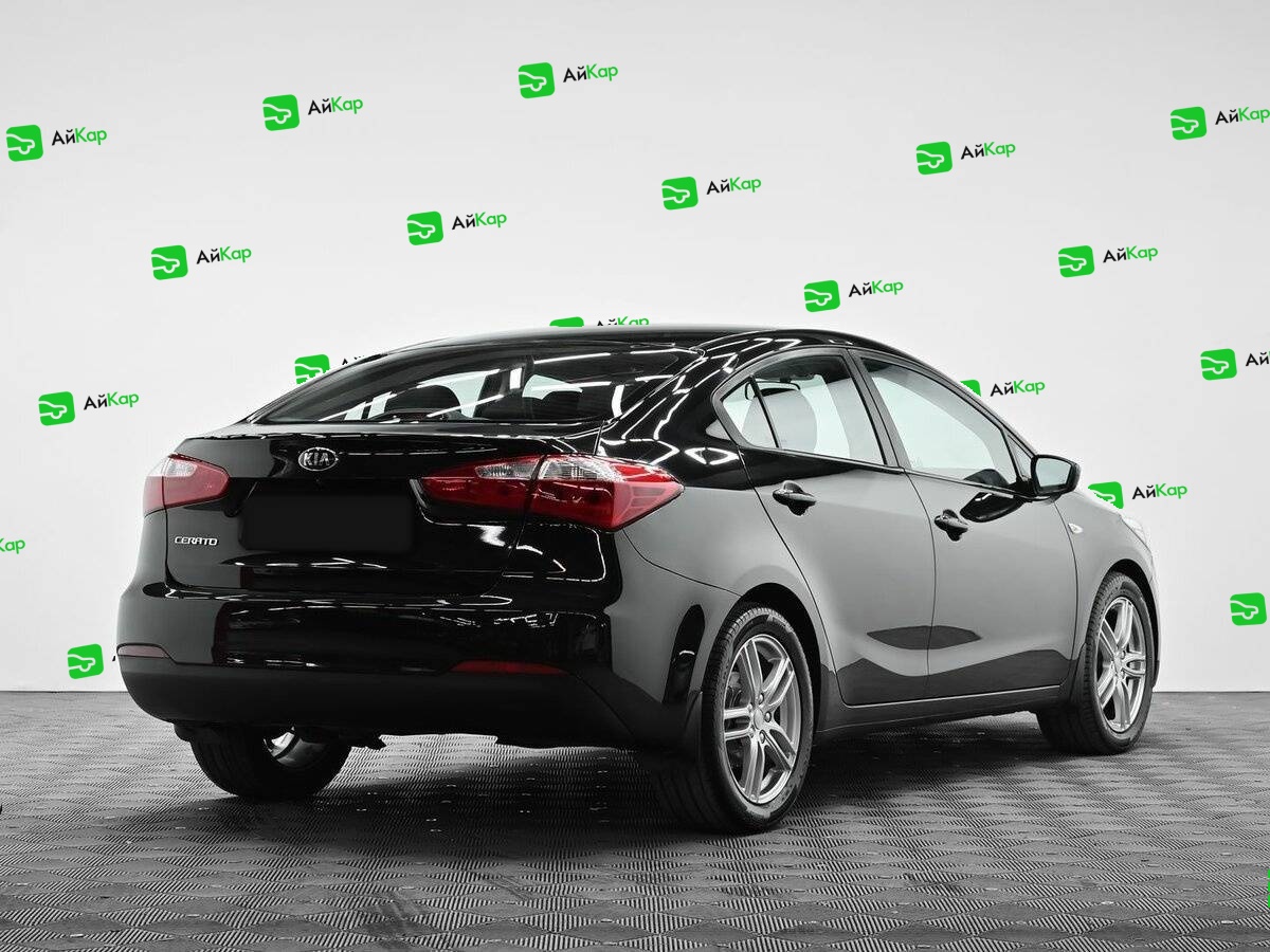 Kia Cerato с пробегом — 2015 год. Фото: #3