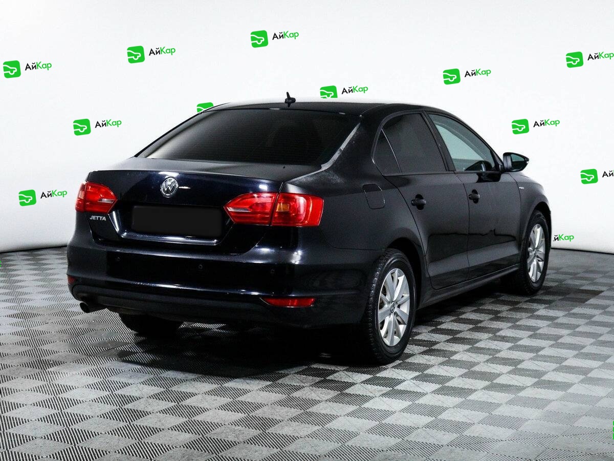Volkswagen Jetta с пробегом — 2013 год. Фото: #4