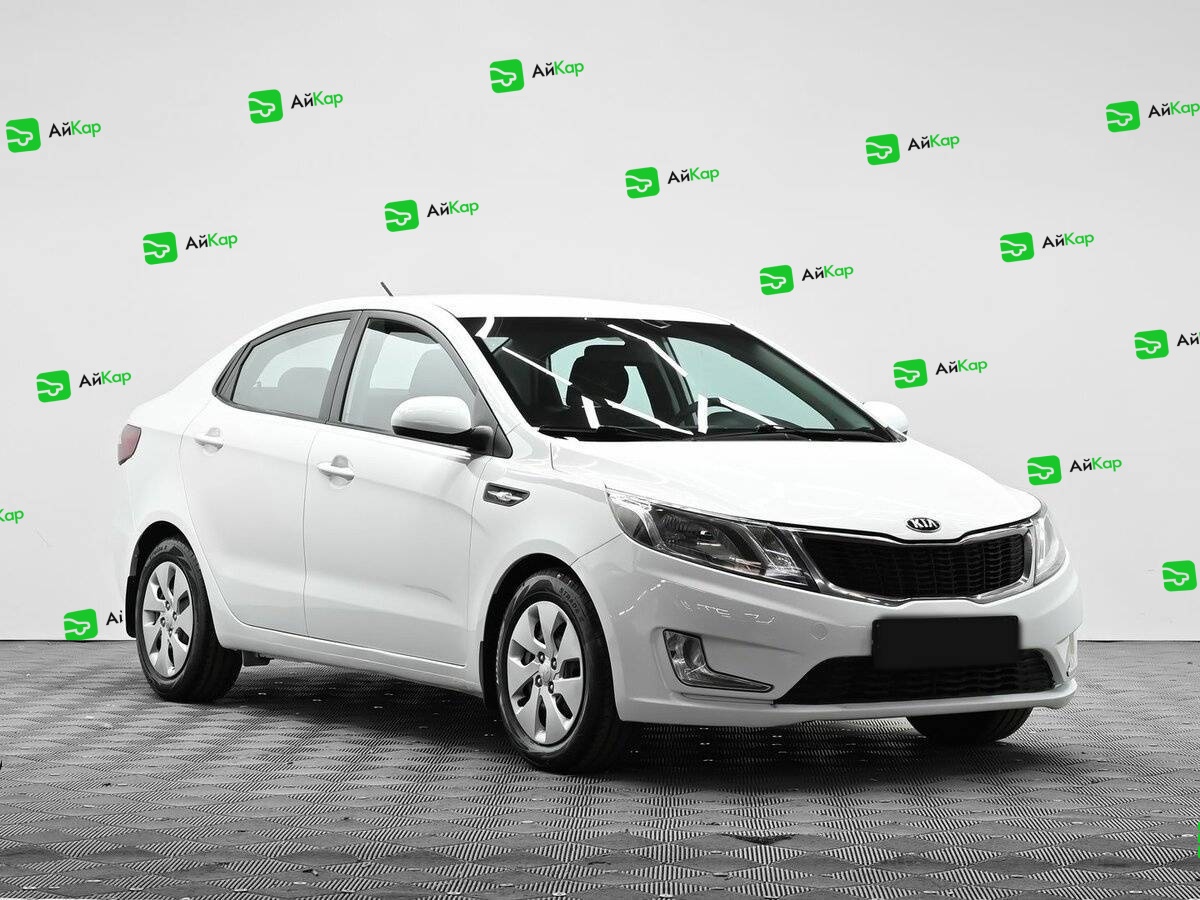 Kia Rio с пробегом — 2013 год. Фото: #1