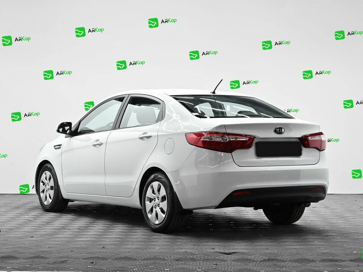 Kia Rio с пробегом — 2013 год. Фото: #2