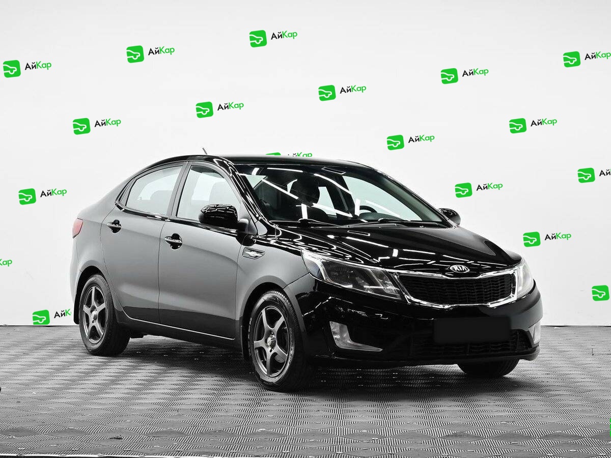 Kia Rio с пробегом — 2014 год. Фото: #1