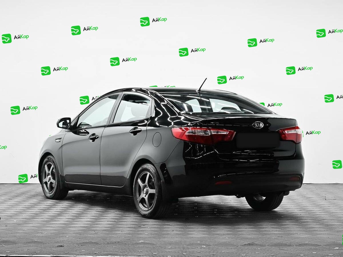 Kia Rio с пробегом — 2014 год. Фото: #2