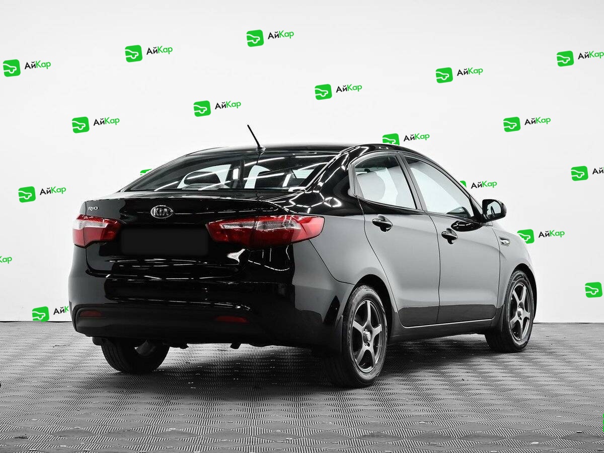 Kia Rio с пробегом — 2014 год. Фото: #3