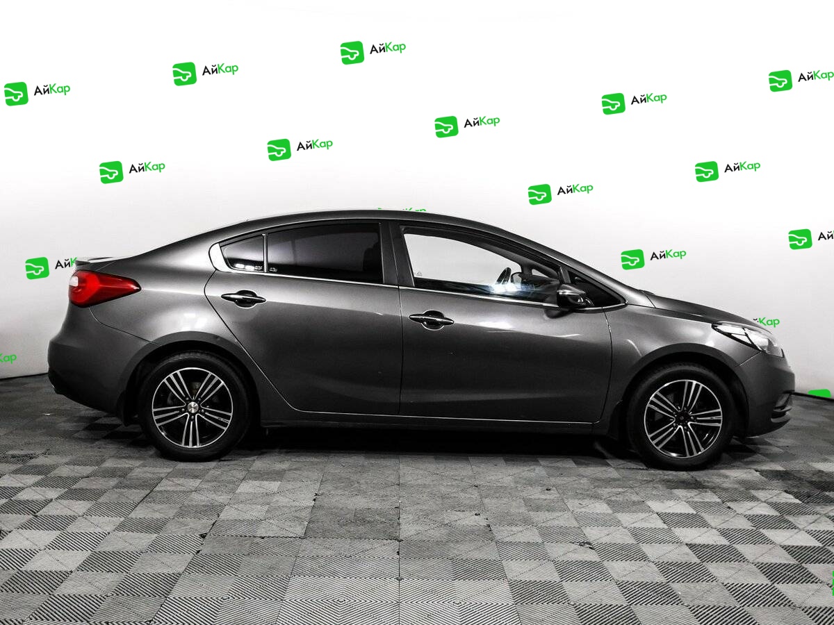 Kia Cerato с пробегом — 2015 год. Фото: #3