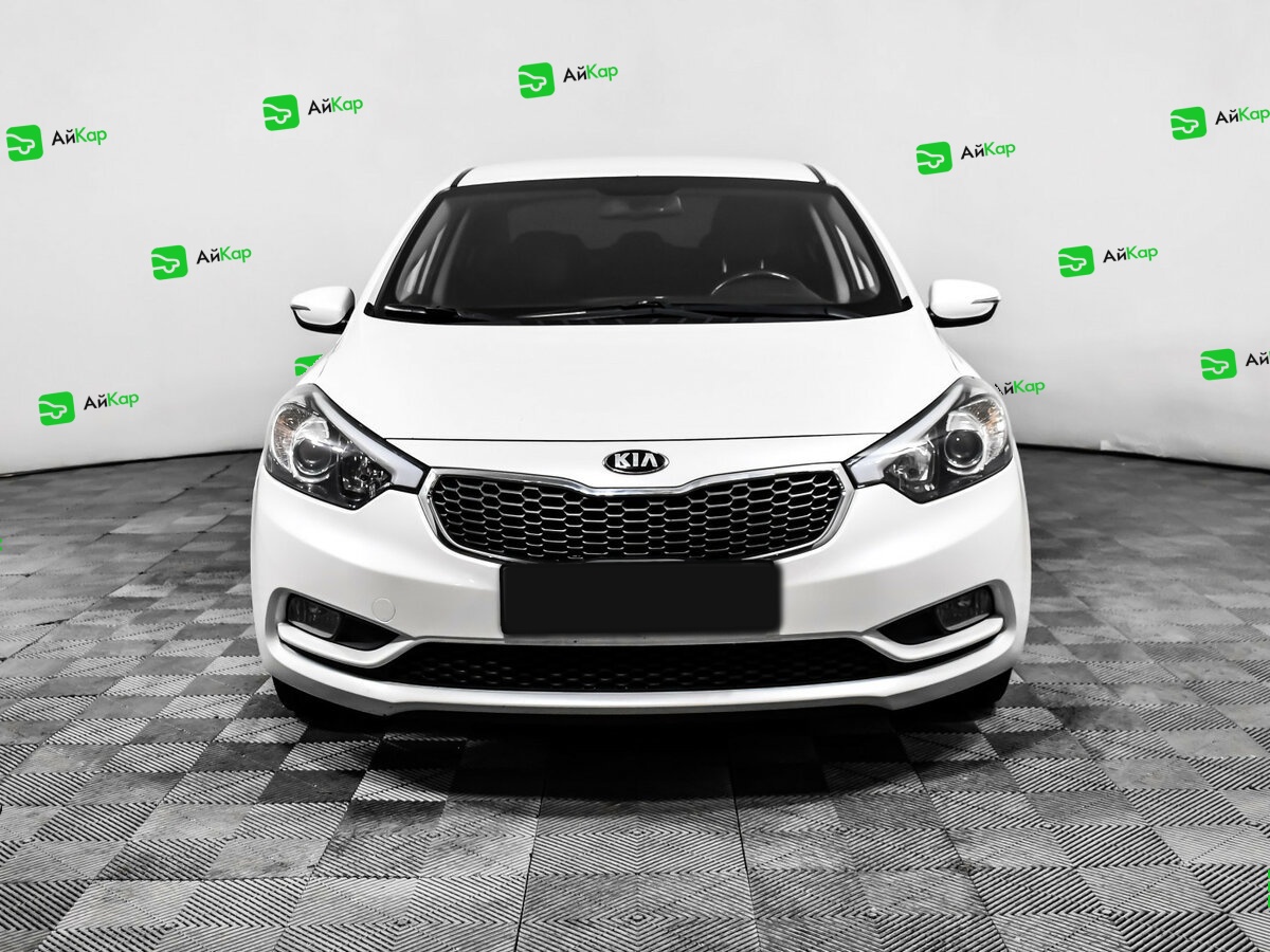 Kia Cerato с пробегом — 2013 год. Фото: #1