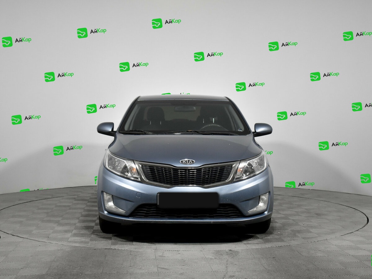 Kia Rio с пробегом — 2012 год. Фото: #1