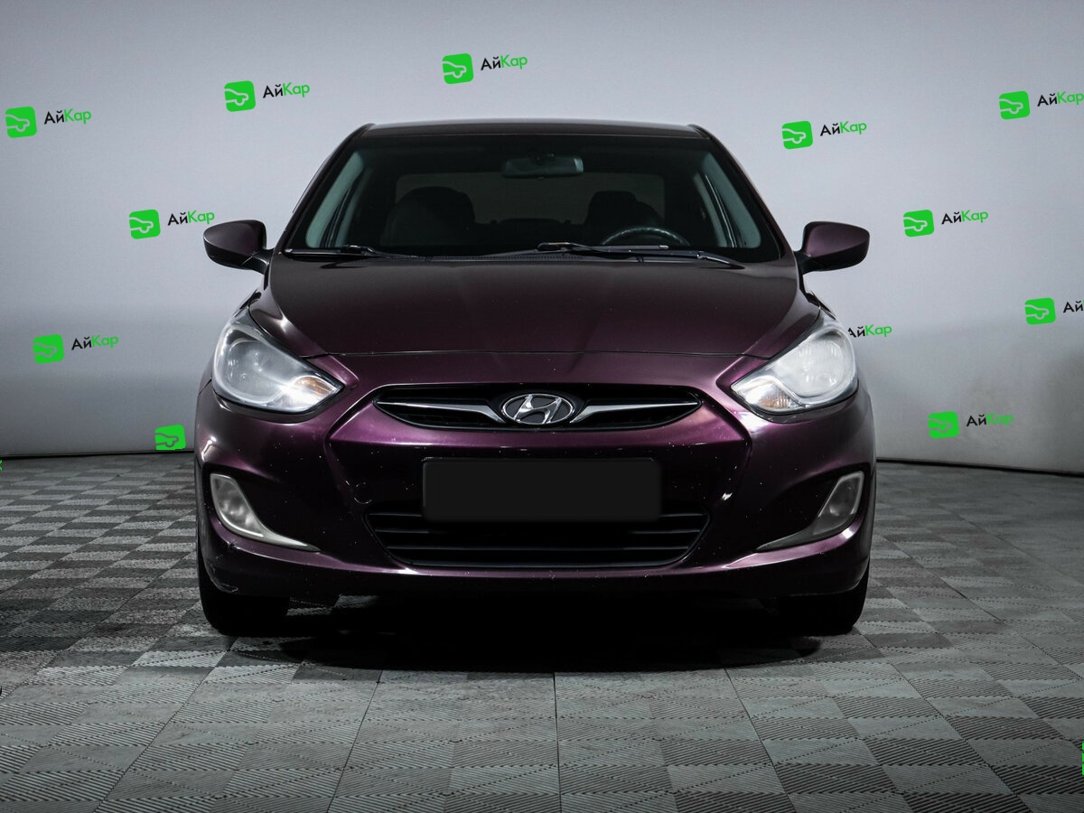 Hyundai Solaris с пробегом — 2013 год. Фото: #1