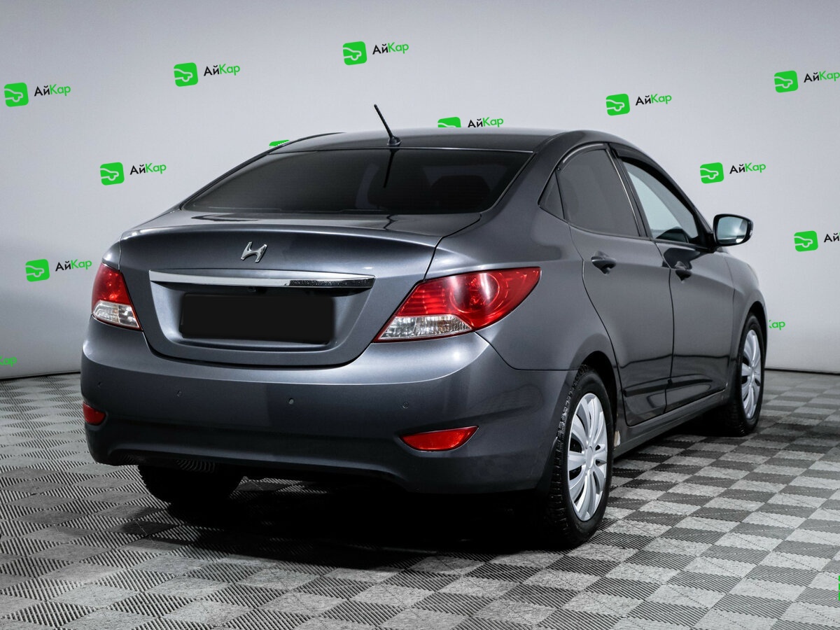 Hyundai Solaris с пробегом — 2012 год. Фото: #3