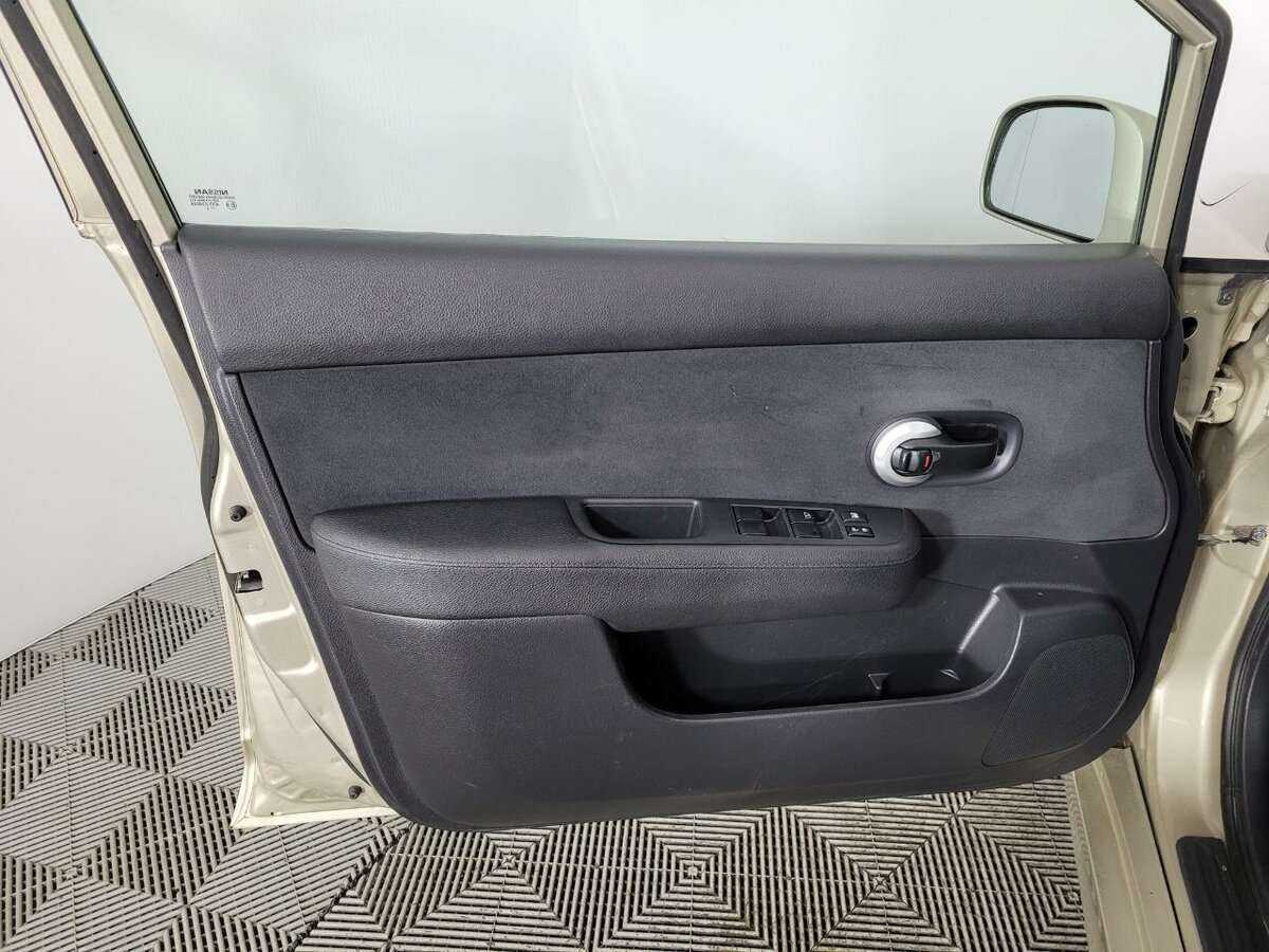 Nissan Tiida с пробегом — 2013 год. Фото: #7