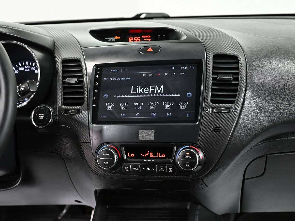 Kia Cerato с пробегом — 2015 год. Фото: #11