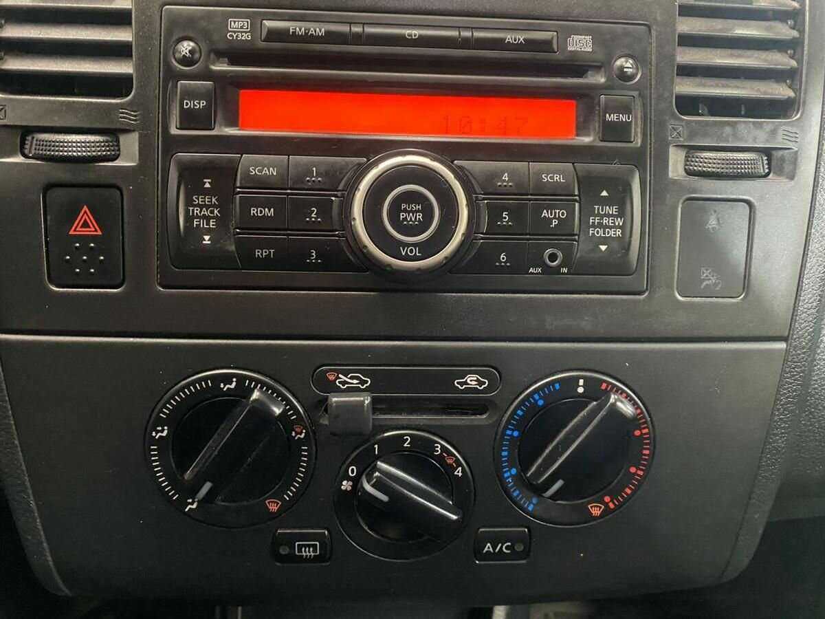 Nissan Tiida с пробегом — 2013 год. Фото: #12