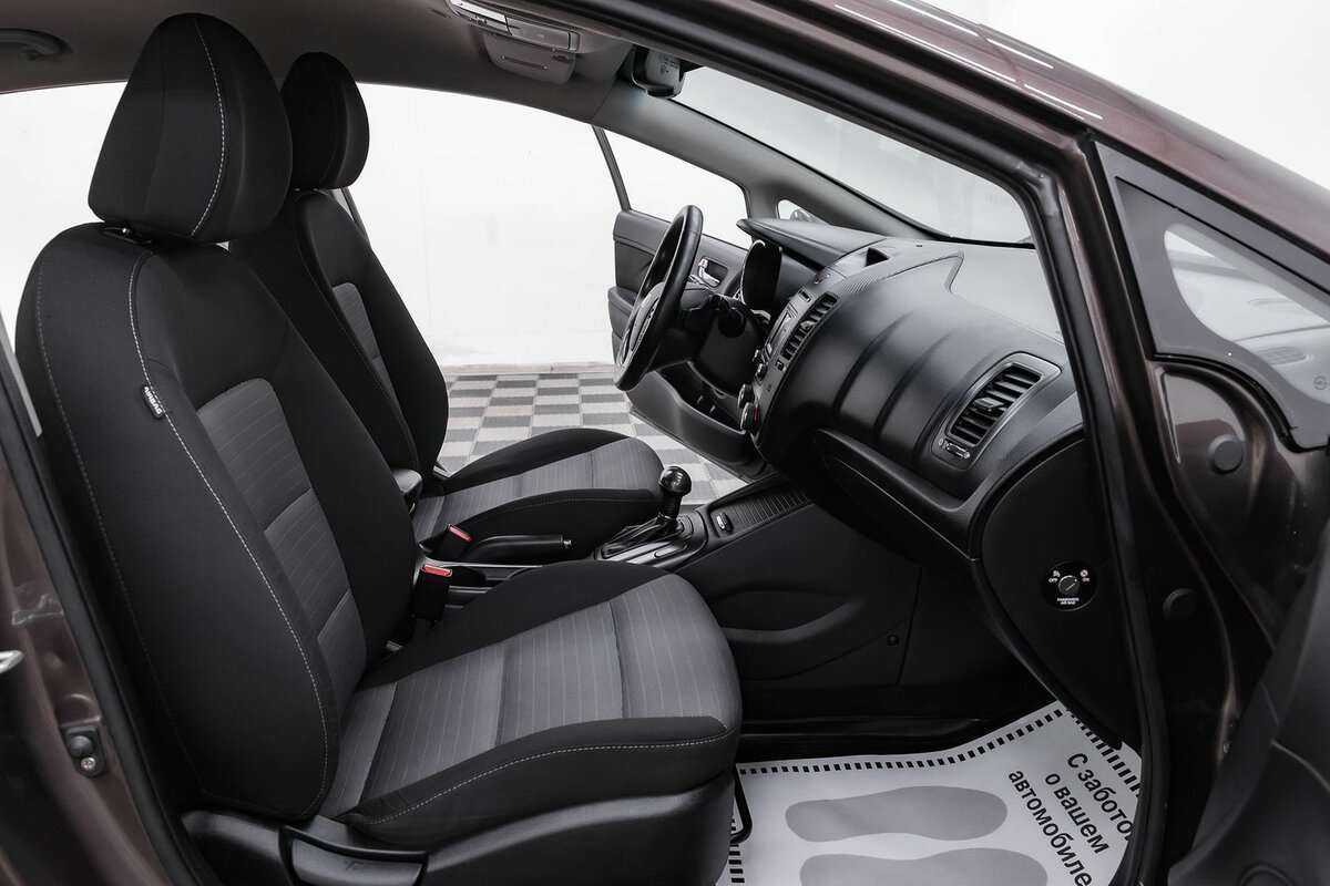 Kia Cerato с пробегом — 2013 год. Фото: #11