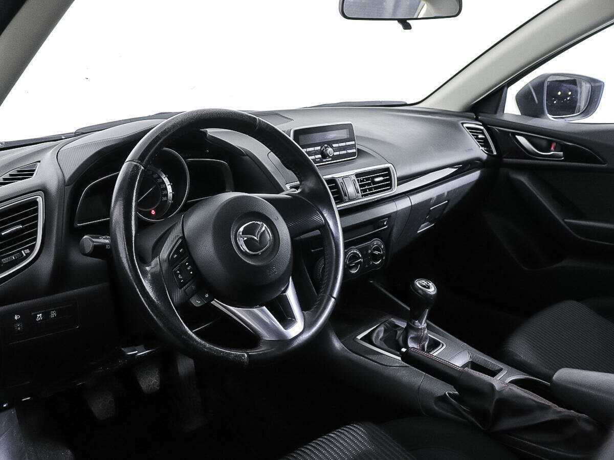 Mazda 3 с пробегом — 2014 год. Фото: #12