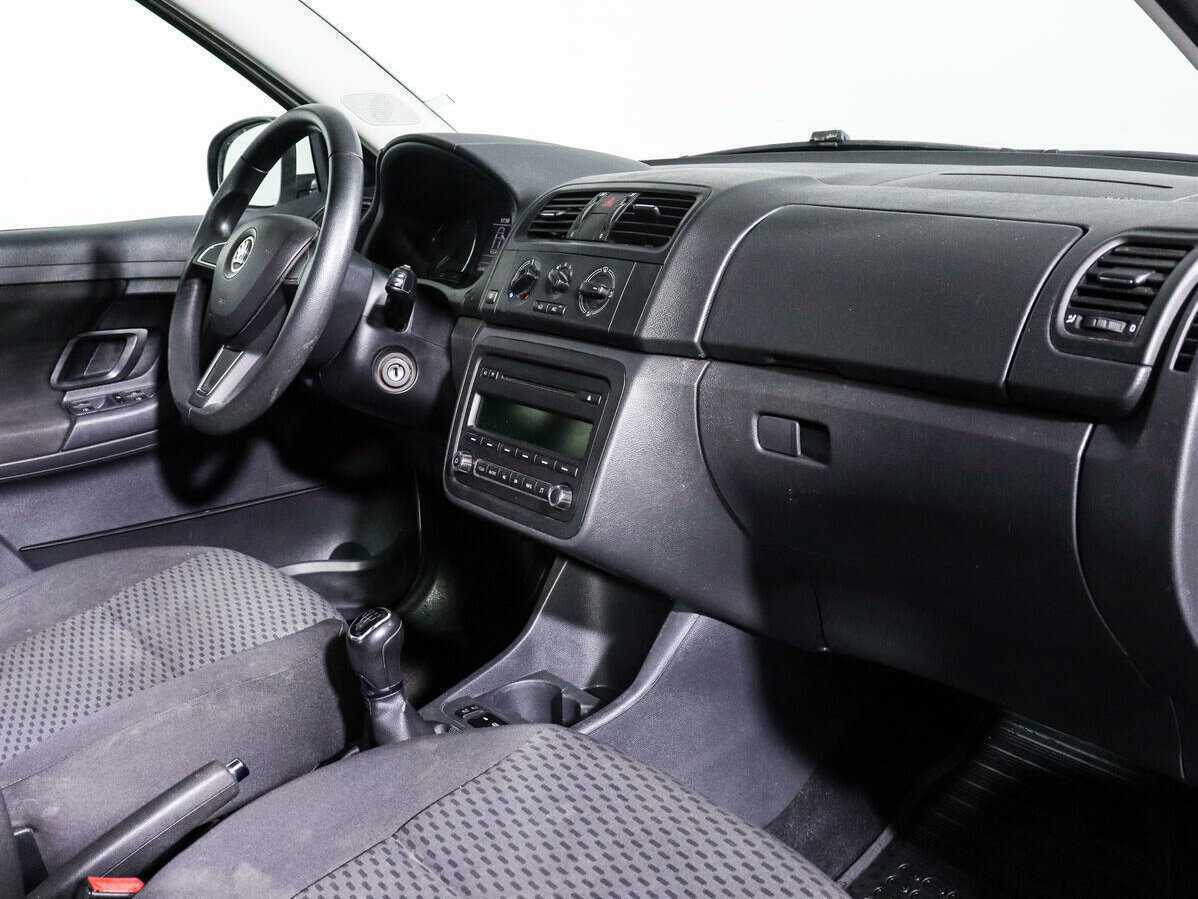 Skoda Fabia с пробегом — 2014 год. Фото: #8