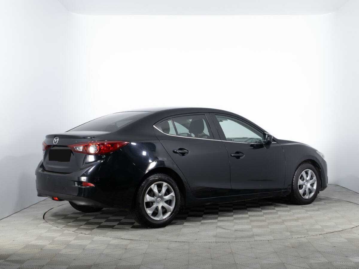 Mazda 3 с пробегом — 2014 год. Фото: #4