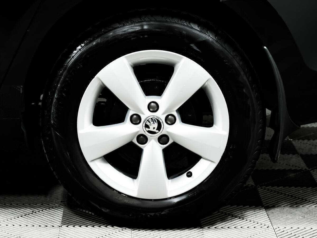Skoda Rapid с пробегом — 2014 год. Фото: #13