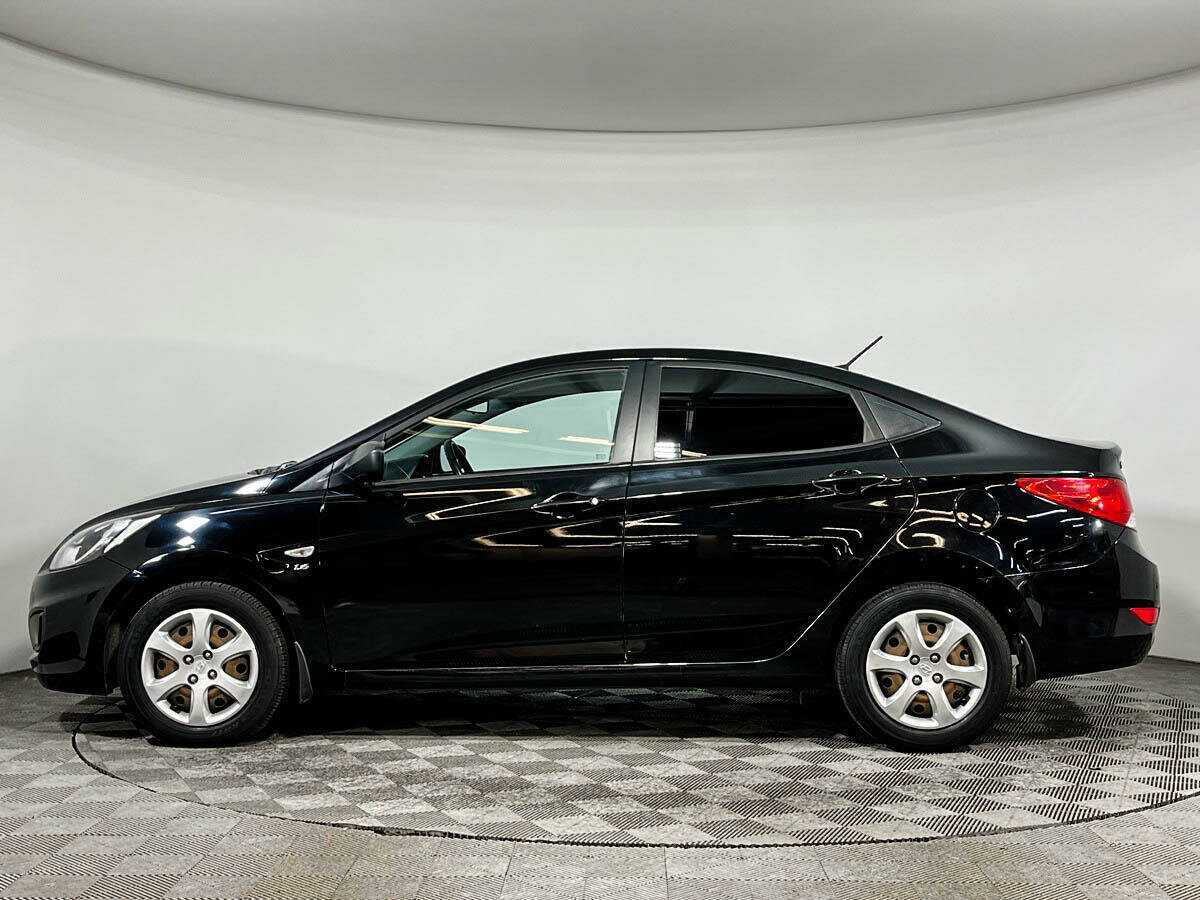 Hyundai Solaris с пробегом — 2012 год. Фото: #7