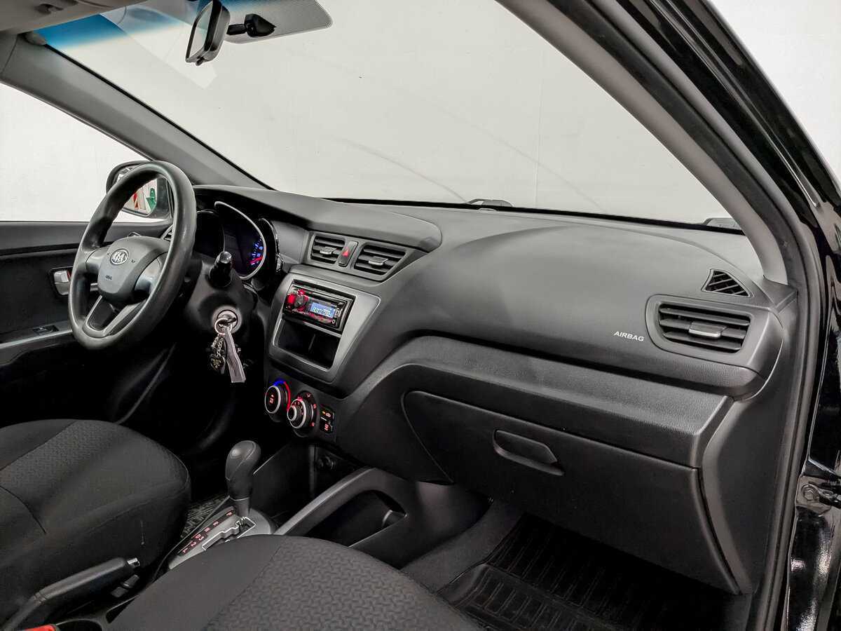 Kia Rio с пробегом — 2013 год. Фото: #10