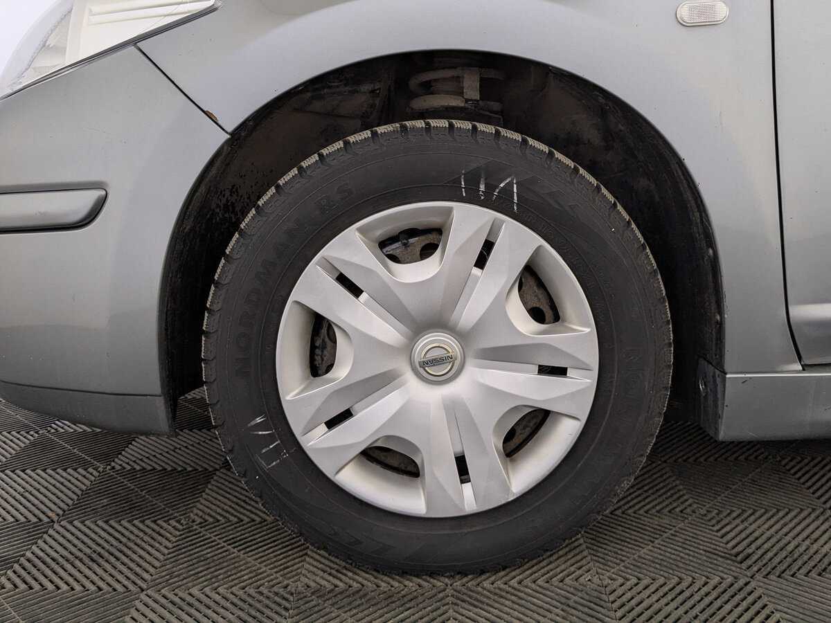 Nissan Tiida с пробегом — 2013 год. Фото: #11