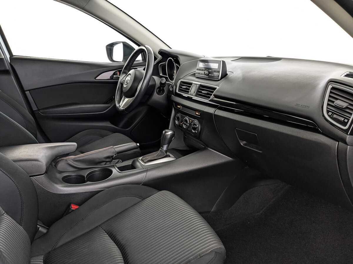 Mazda 3 с пробегом — 2014 год. Фото: #12