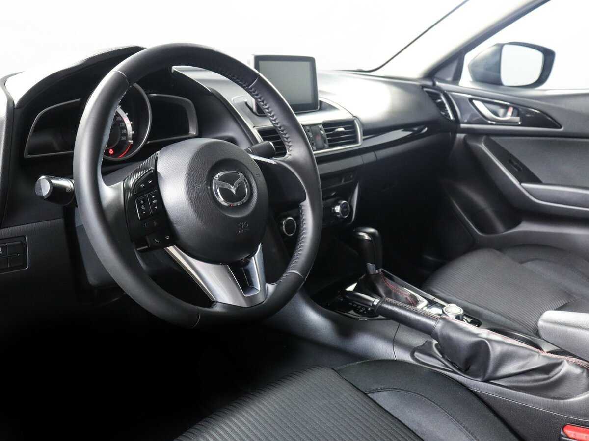 Mazda 3 с пробегом — 2014 год. Фото: #13