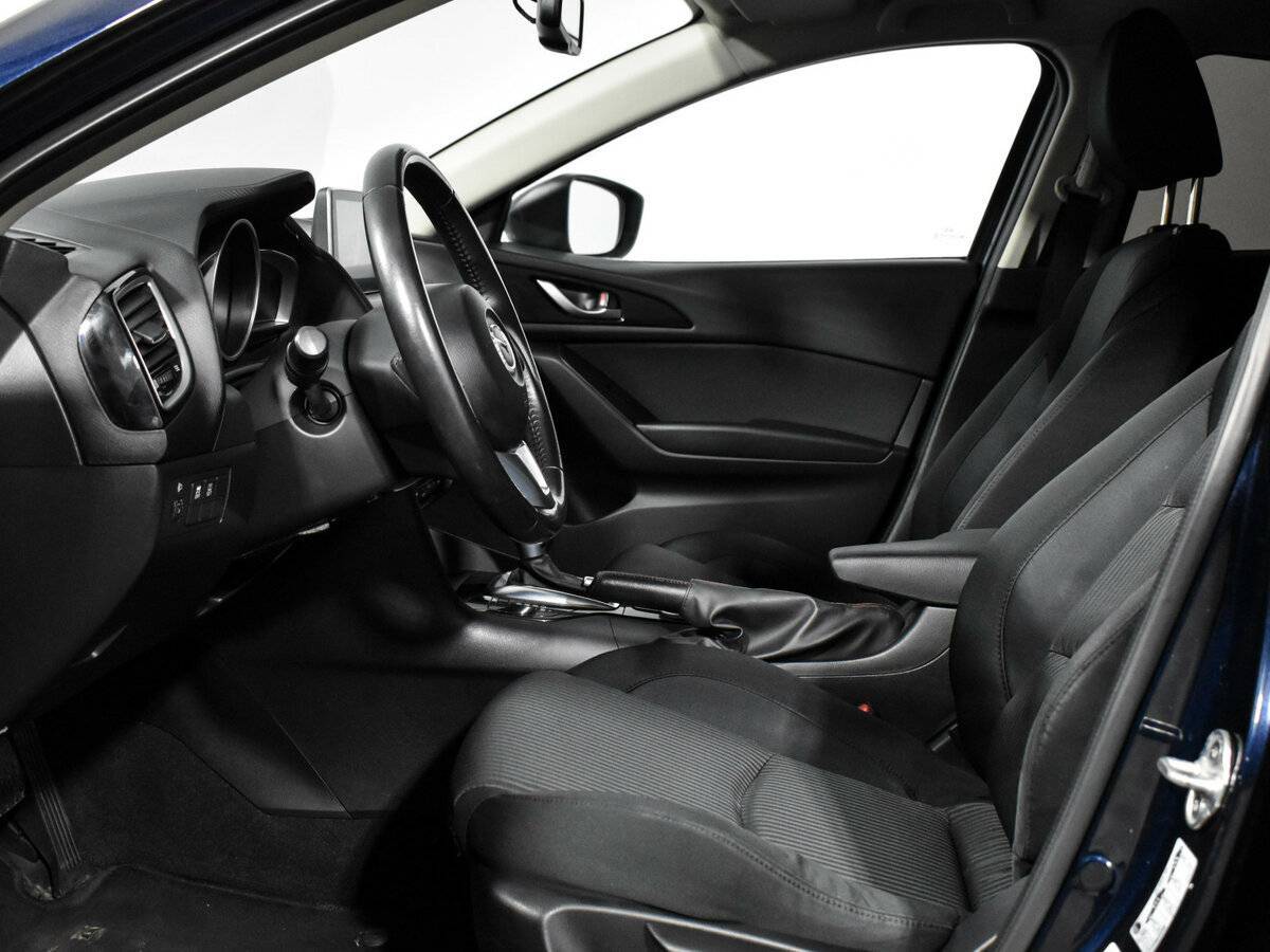 Mazda 3 с пробегом — 2014 год. Фото: #11