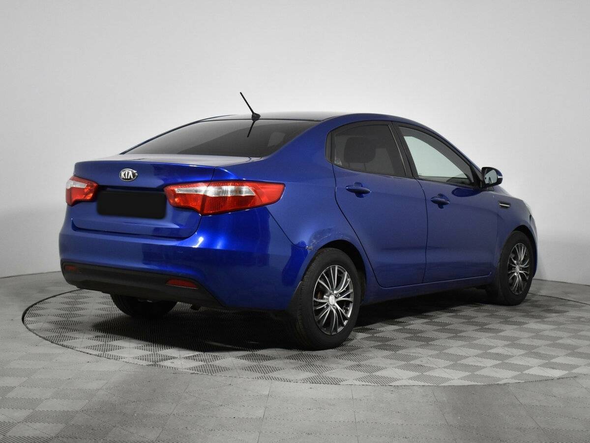 Kia Rio с пробегом — 2013 год. Фото: #4