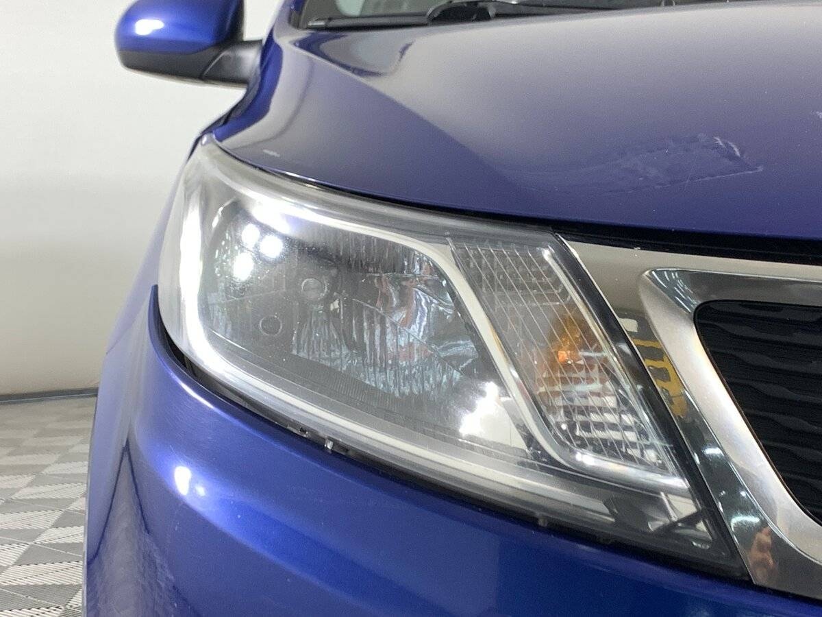 Kia Rio с пробегом — 2013 год. Фото: #8